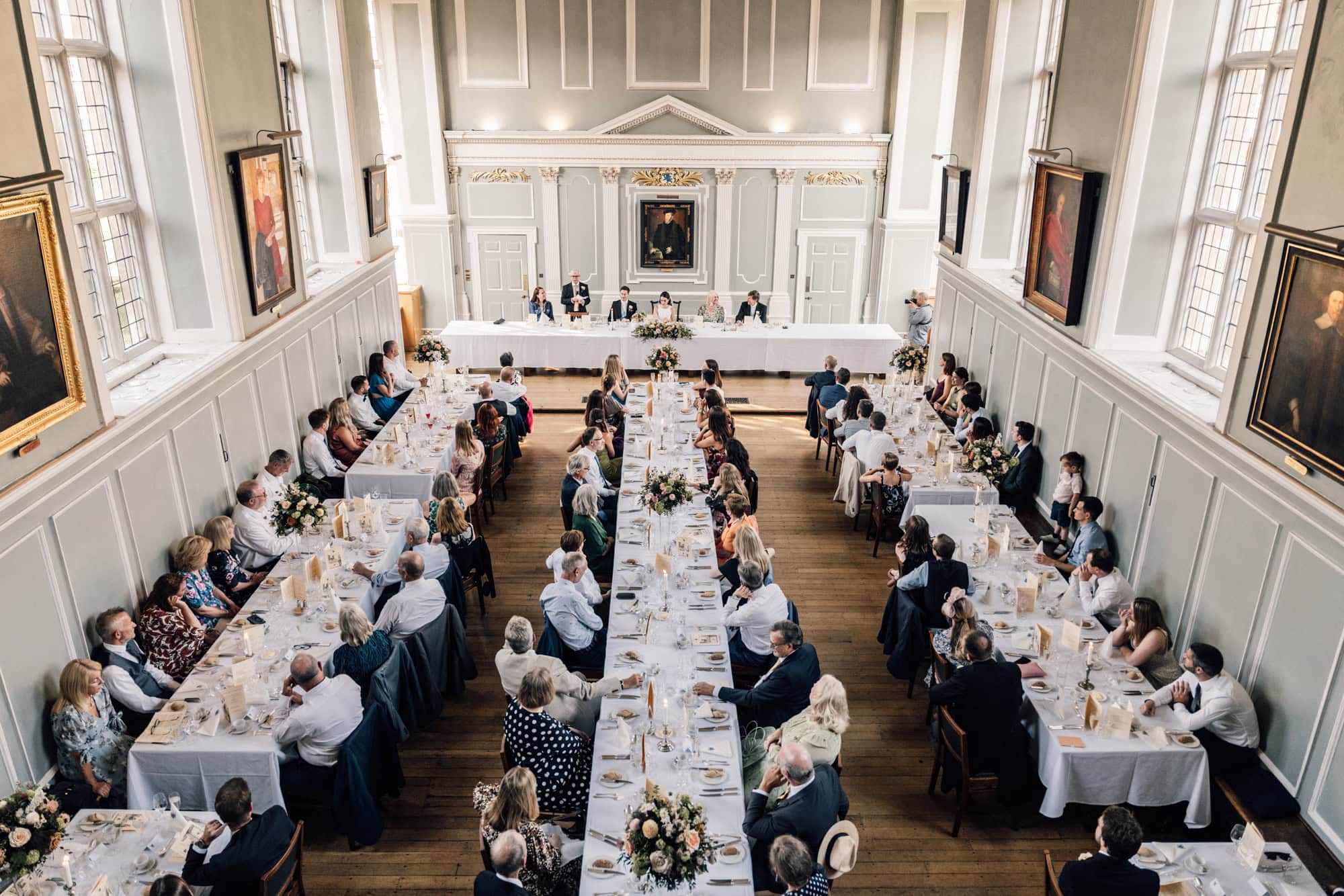 An overhead view of the grand dining hall at Emmanuel Collge during a Wedding