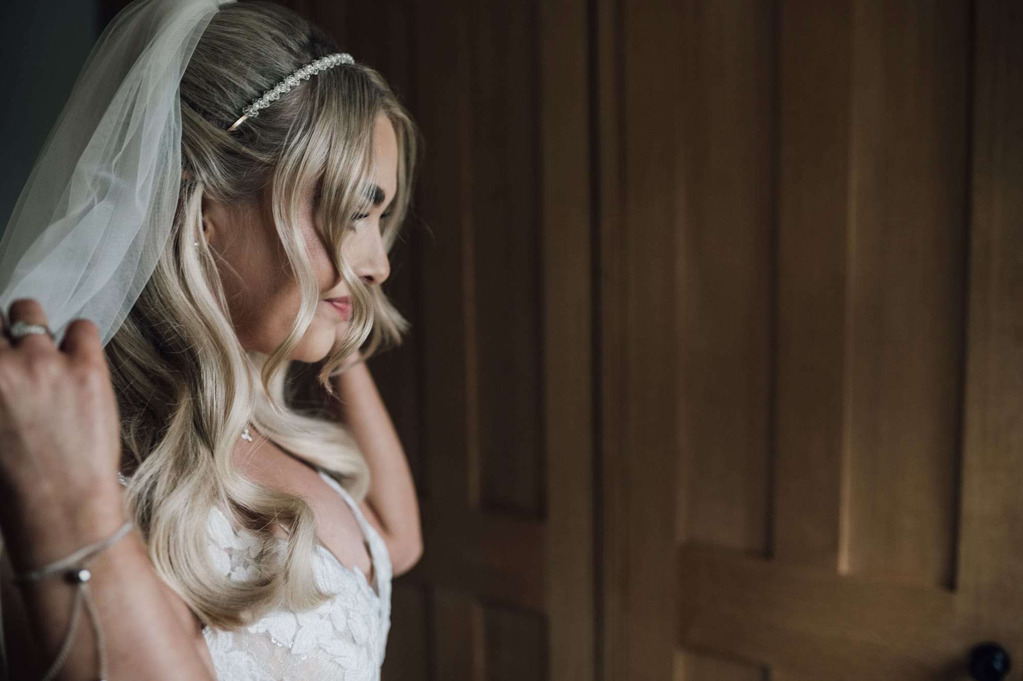 Beautiful Bride looking in the mirror