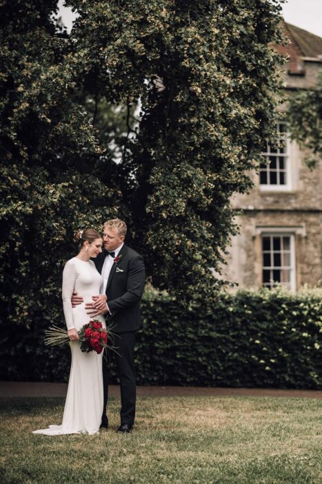 elegant bride and groom in the abbey gardens bury st edmunds